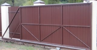 Купить откатные ворота из профнастила Добрянка, цена от 1782 руб.