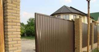 Купить откатные ворота из профнастила Добрянка, цена от 1782 руб.